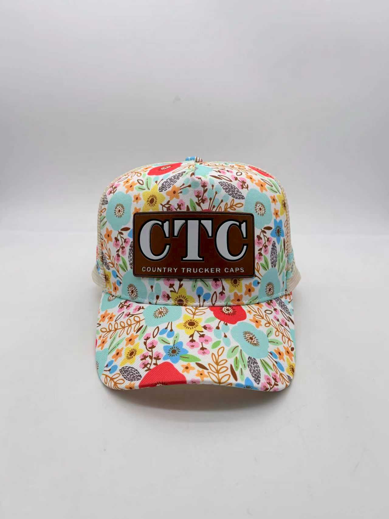 FLORAL LEATHER PATCH TRUCKER CAP