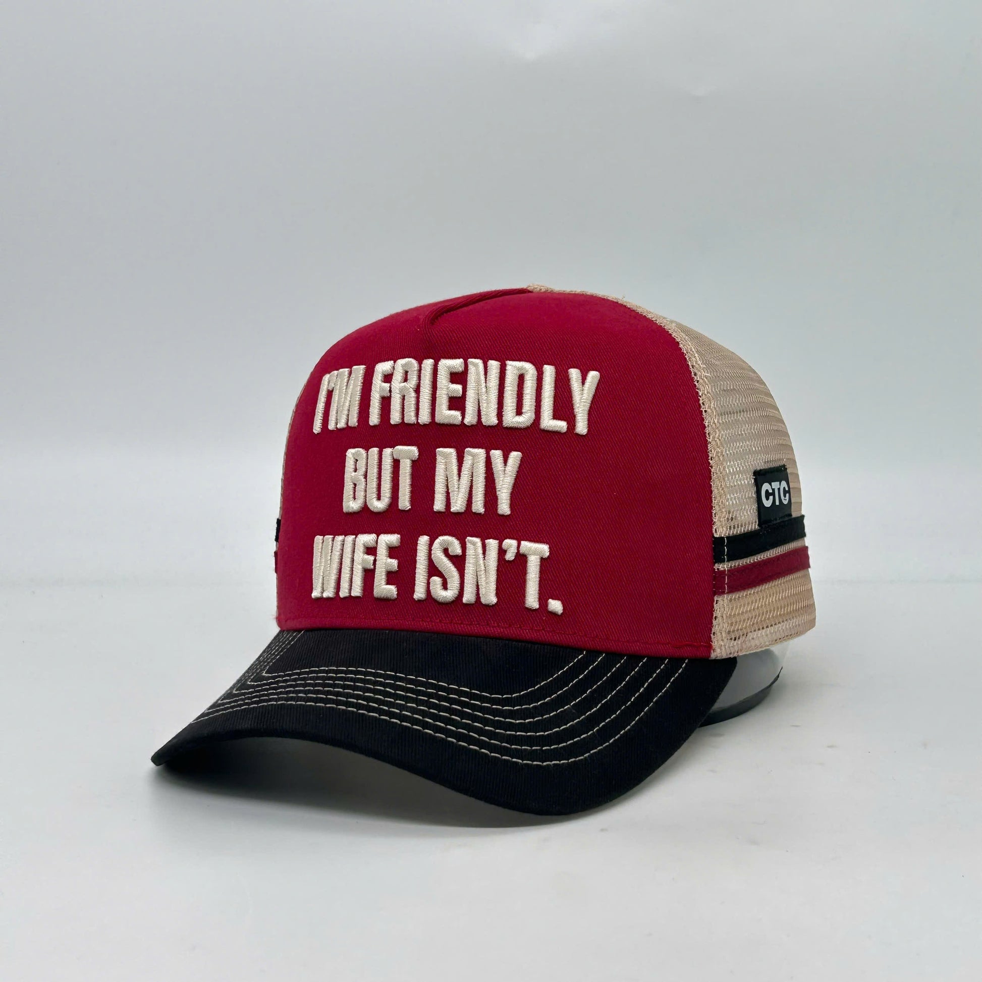 I'M FRIENDLY BUT MY WIFE ISN'T TRUCKER CAP