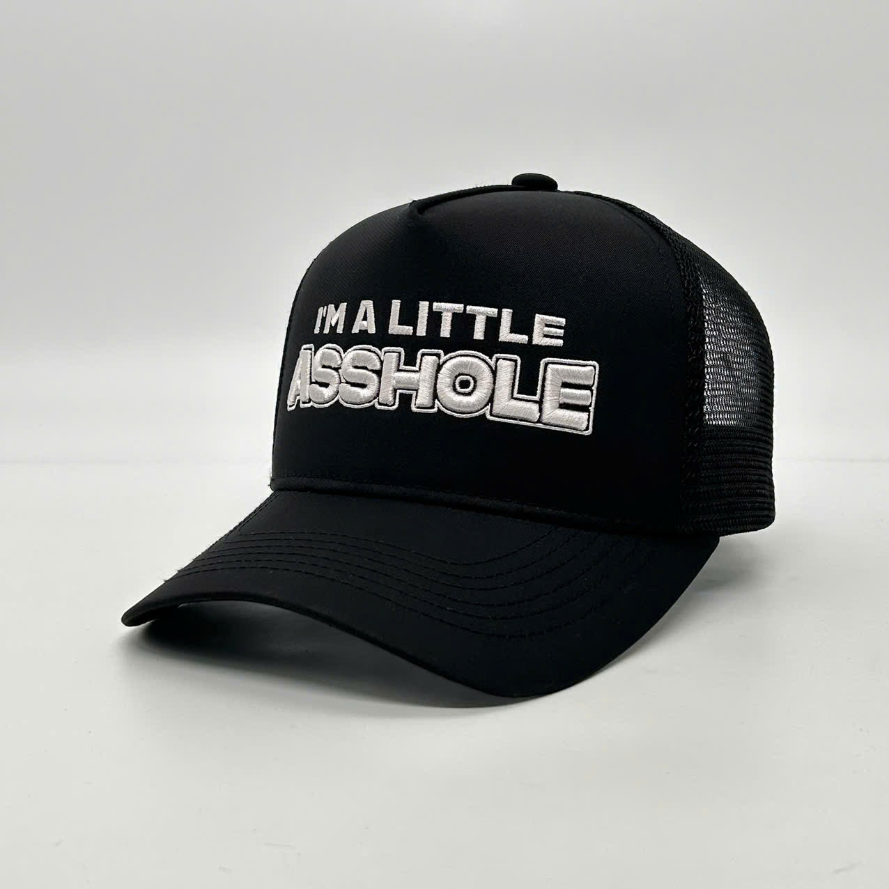 I'M A LITTLE ASSHOLE TRUCKER CAP