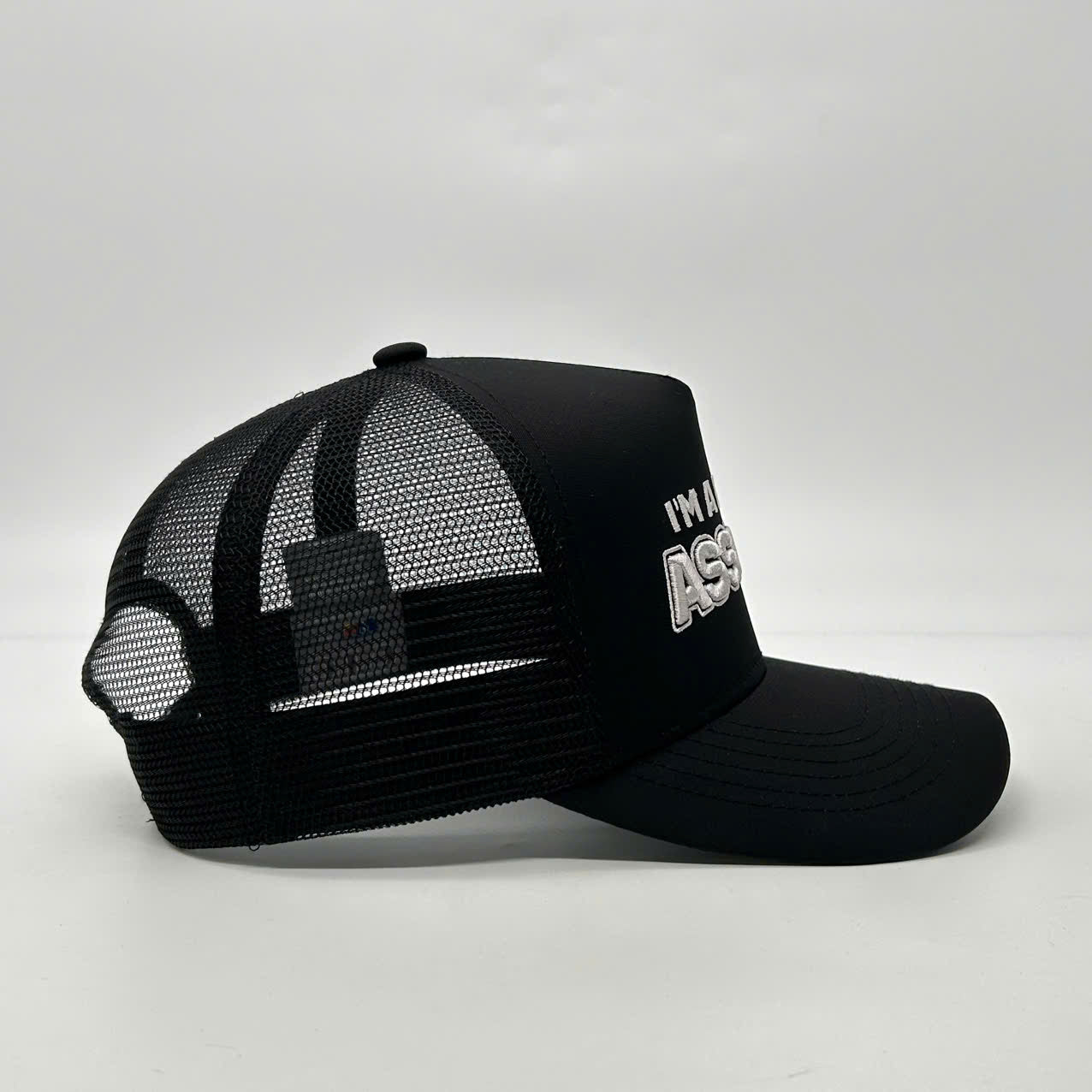 I'M A LITTLE ASSHOLE TRUCKER CAP