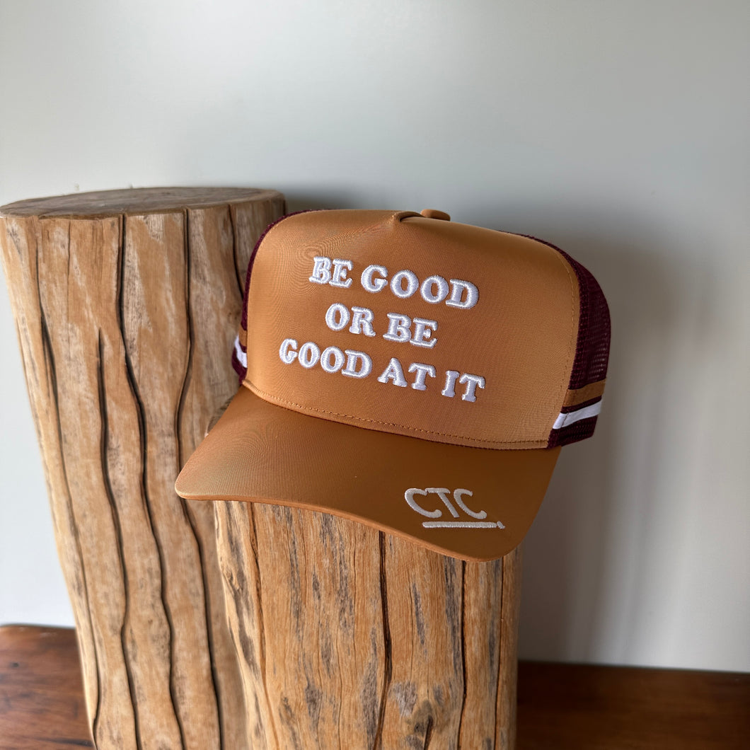 Be Good Or Be Good At It Trucker Cap