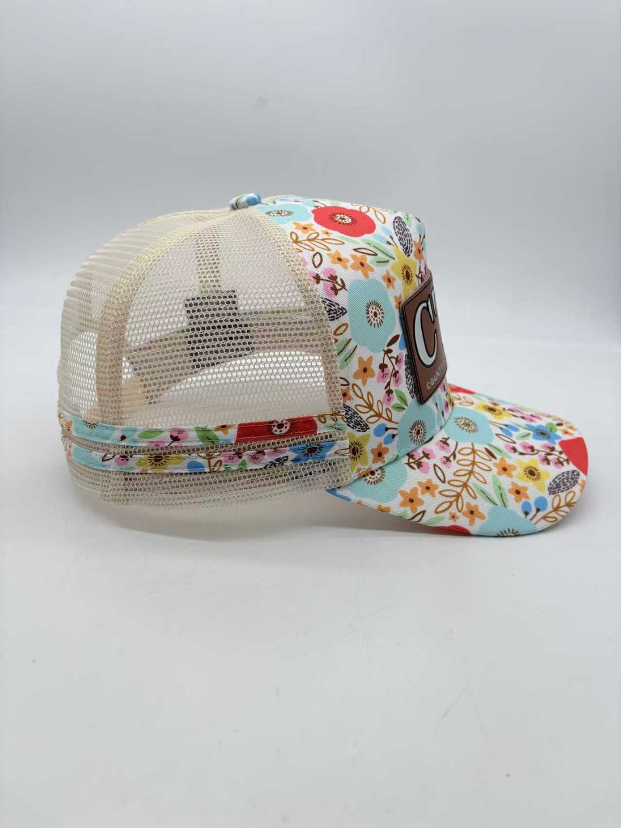 FLORAL LEATHER PATCH TRUCKER CAP