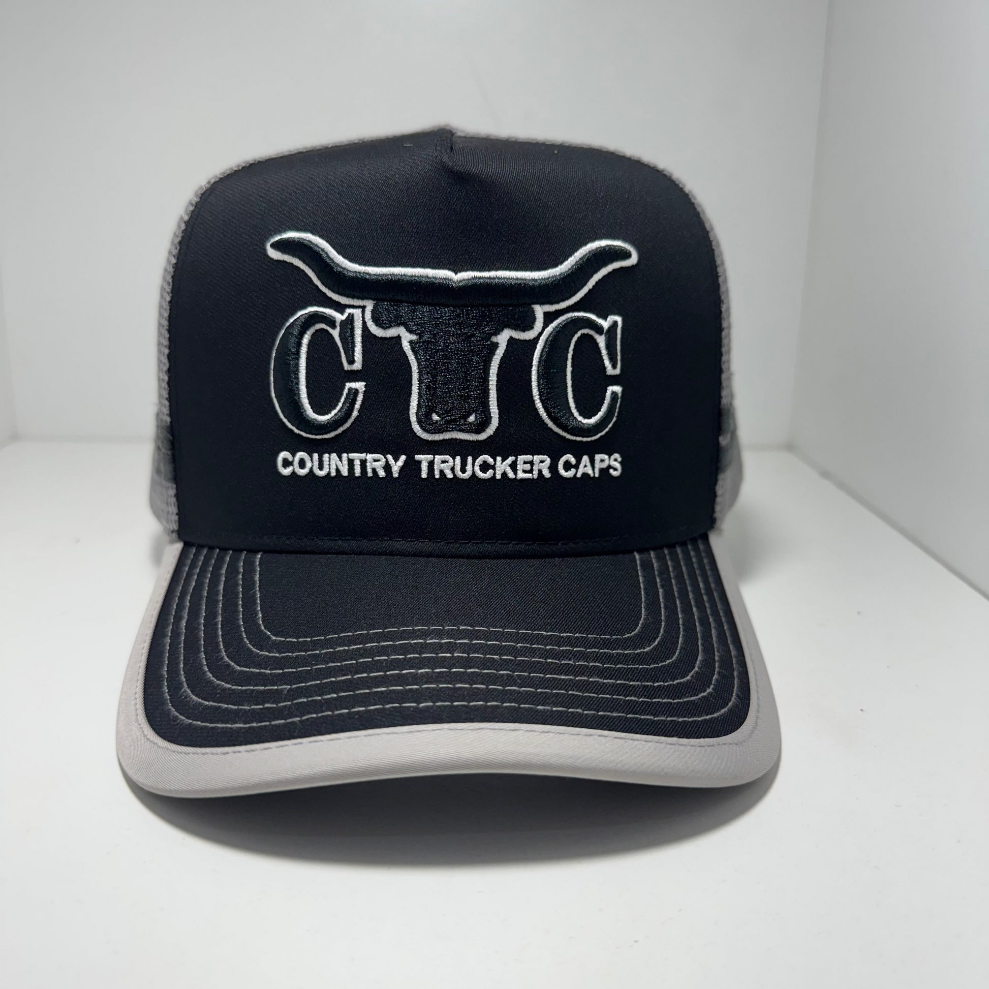 GREY BLACK BULLHORN TRUCKER CAP