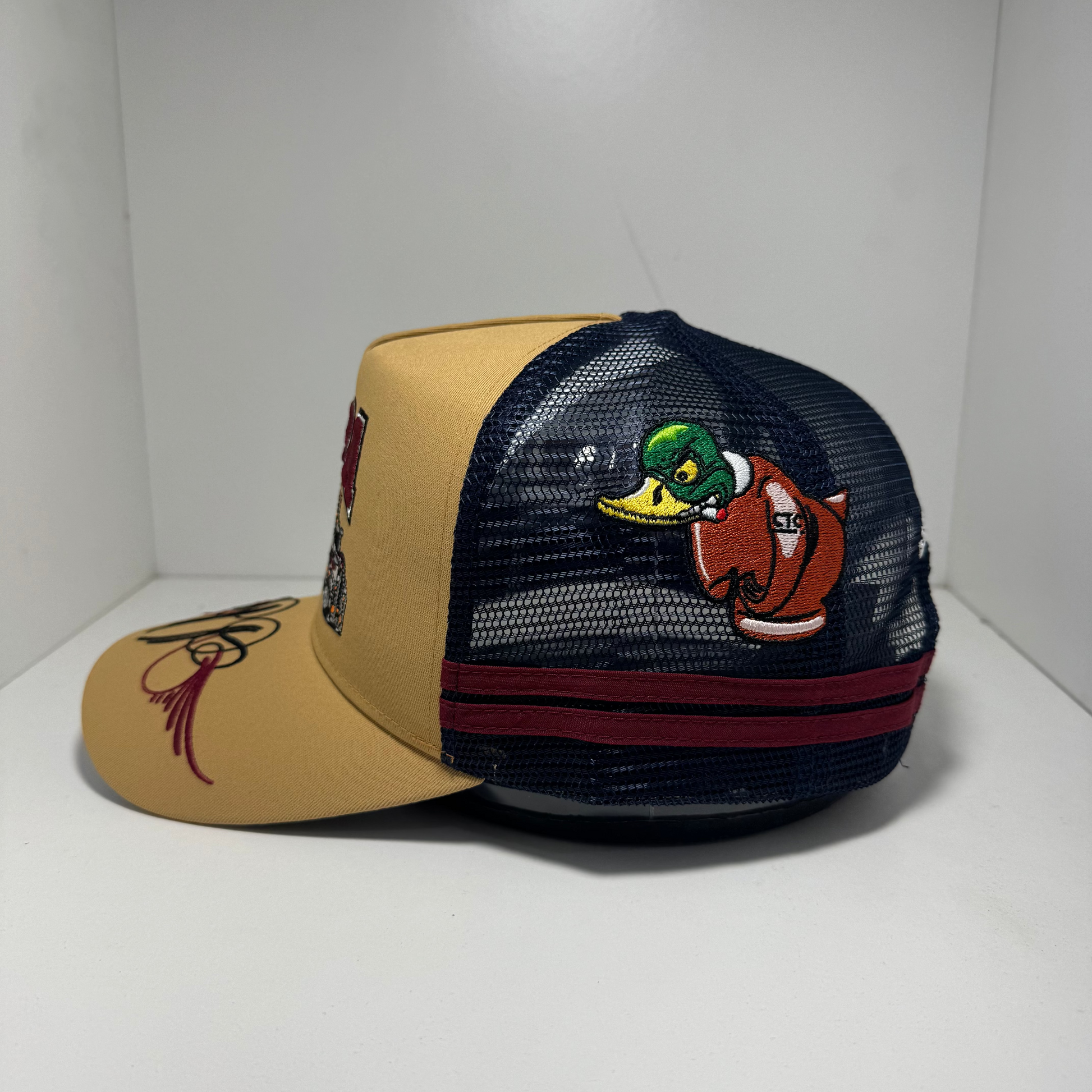 UPPA CARAMEL NAVY TRUCKER CAP