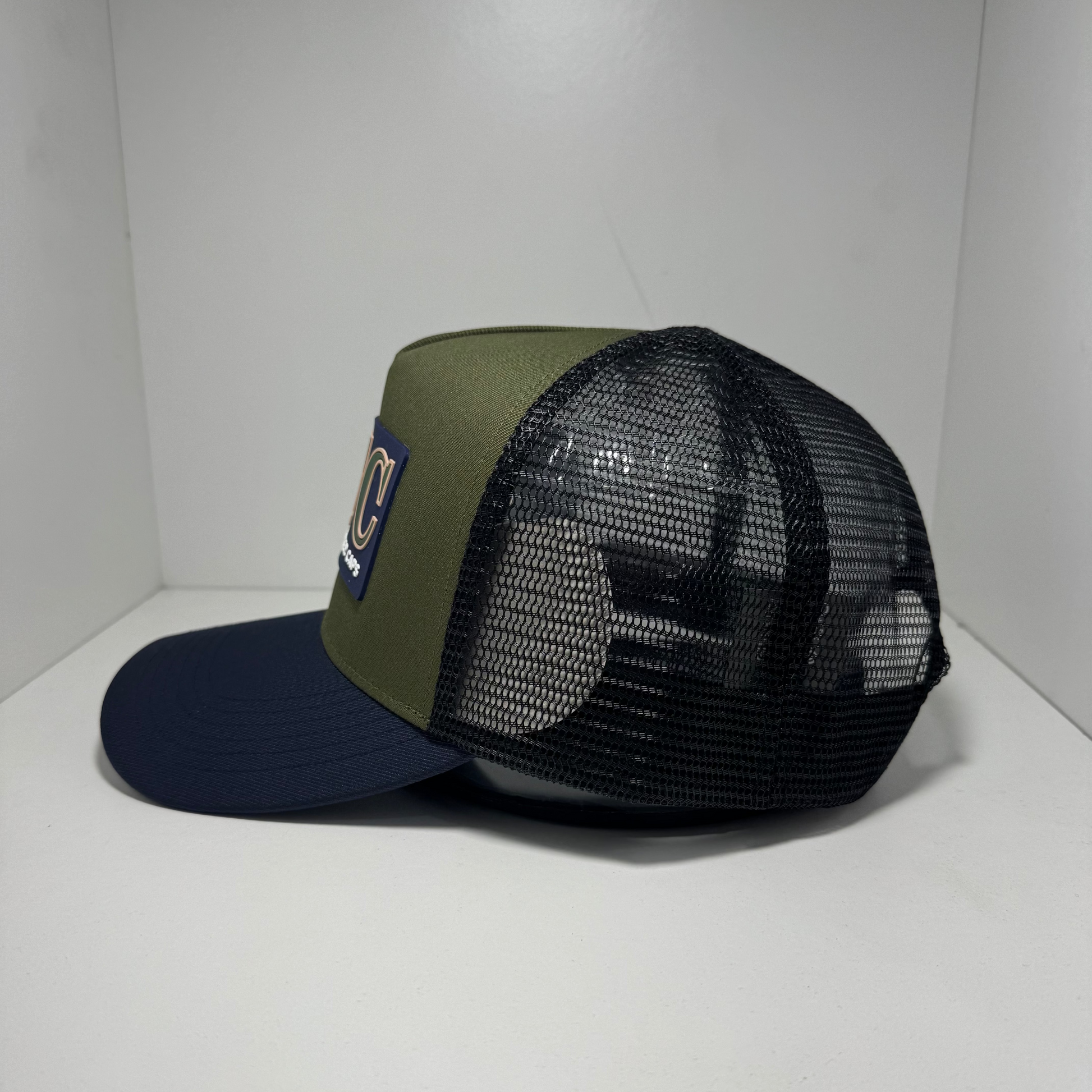 NAVY RUBBER PATCH TRUCKER CAP