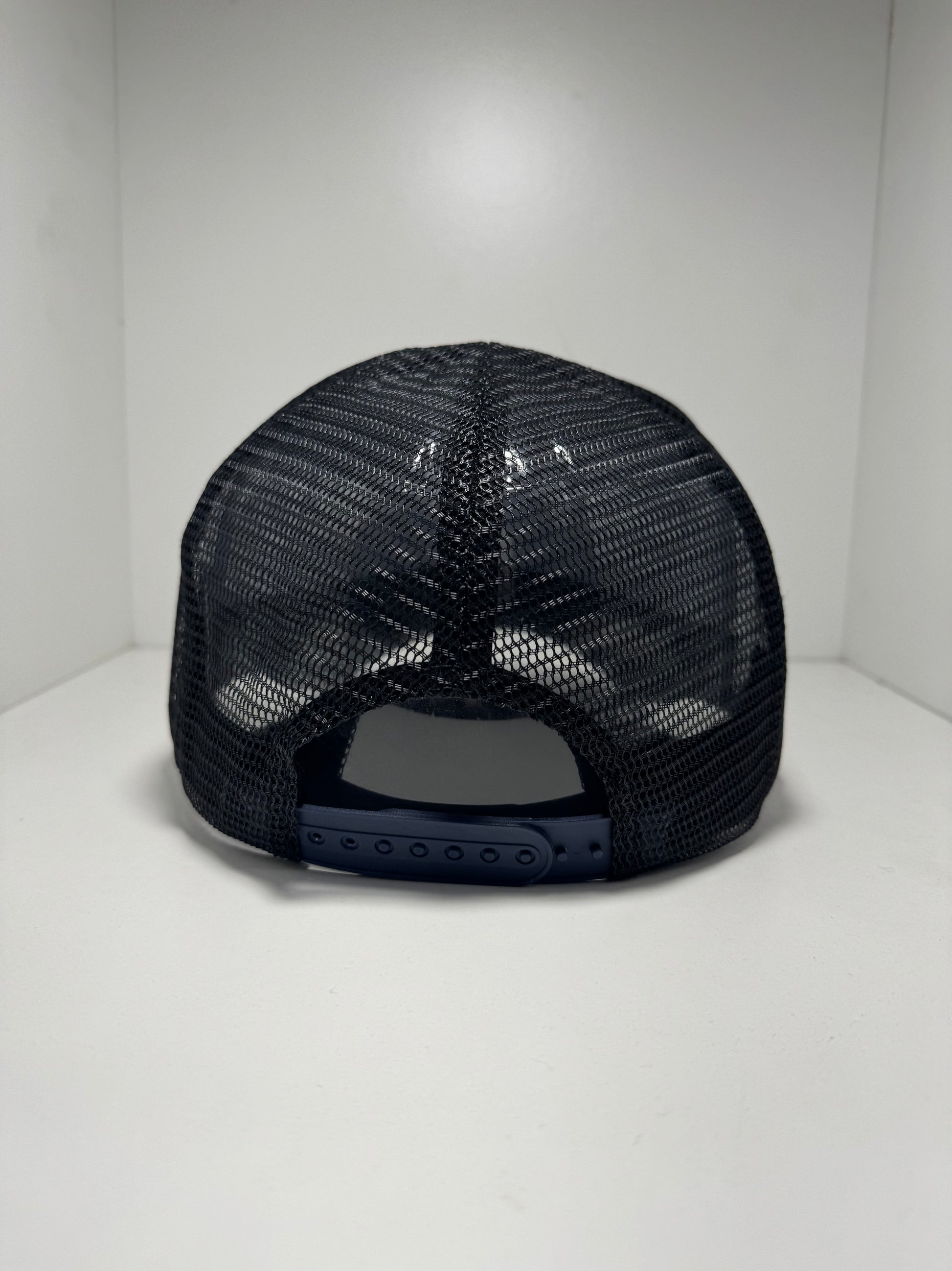 NAVY RUBBER PATCH TRUCKER CAP