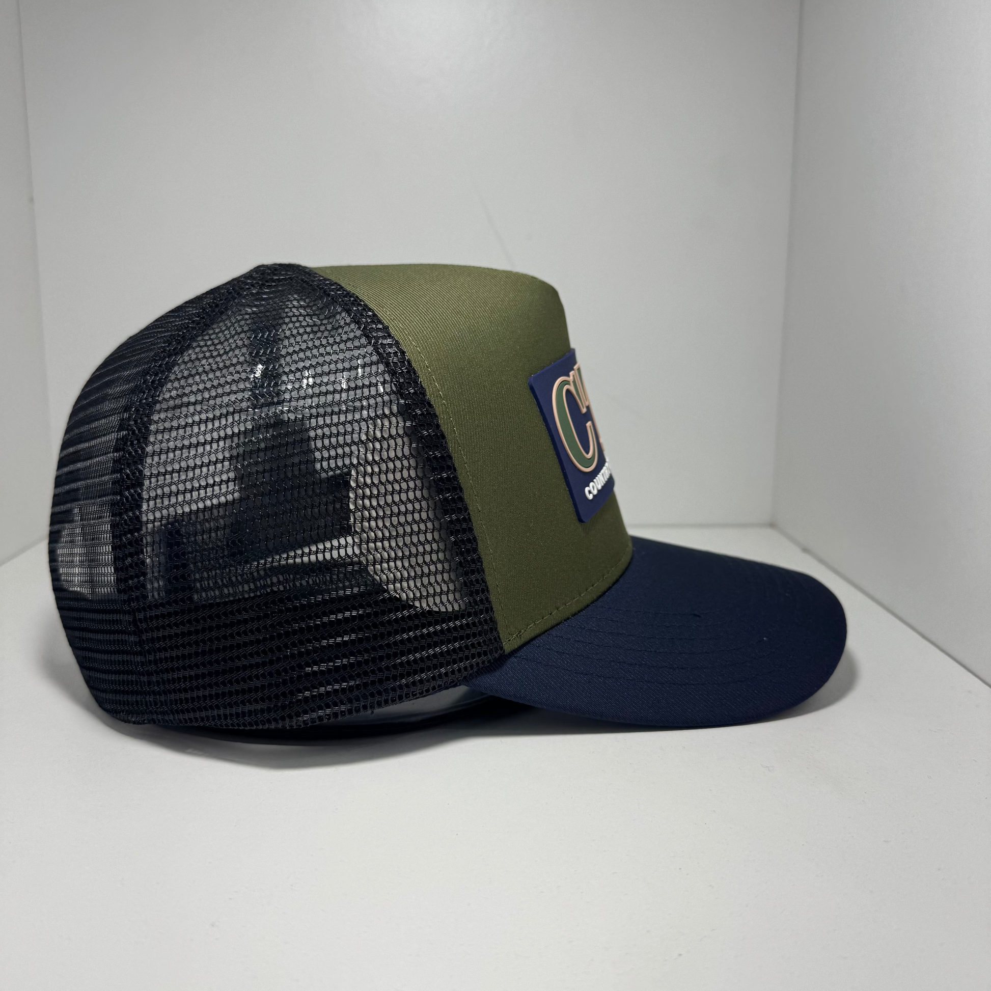 NAVY RUBBER PATCH TRUCKER CAP