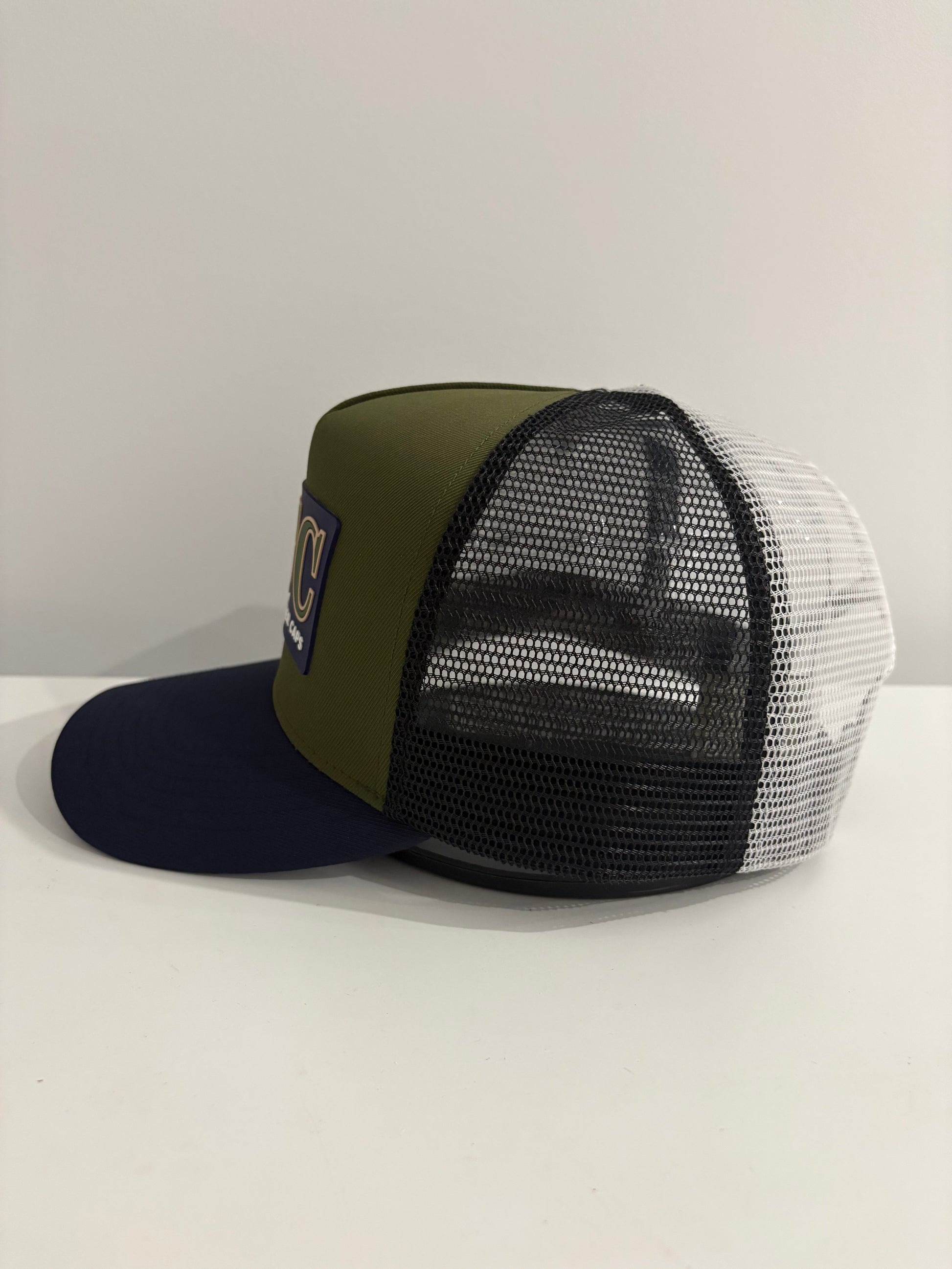 NAVY RUBBER PATCH TRUCKER CAP