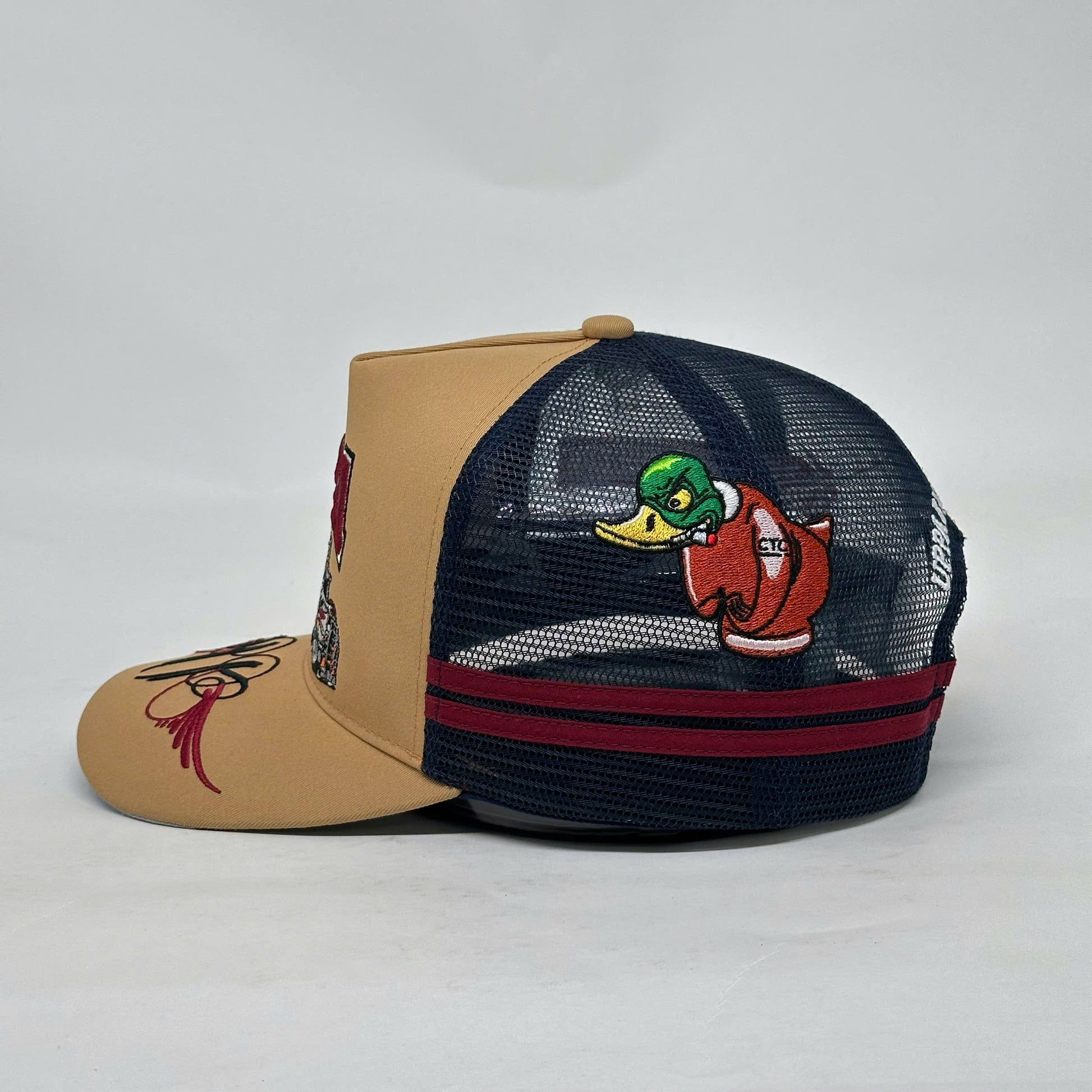 UPPA CARAMEL NAVY TRUCKER CAP