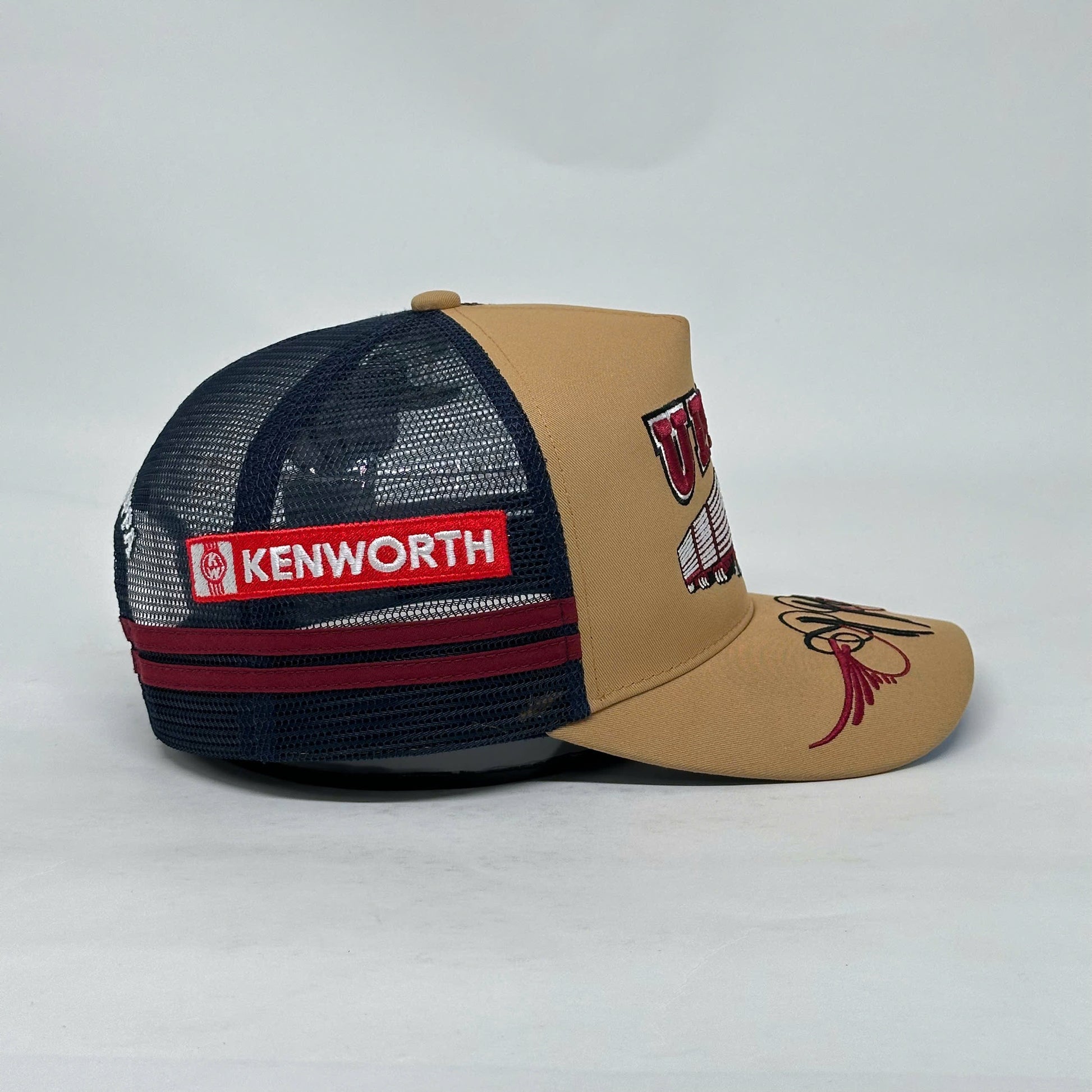 UPPA CARAMEL NAVY TRUCKER CAP