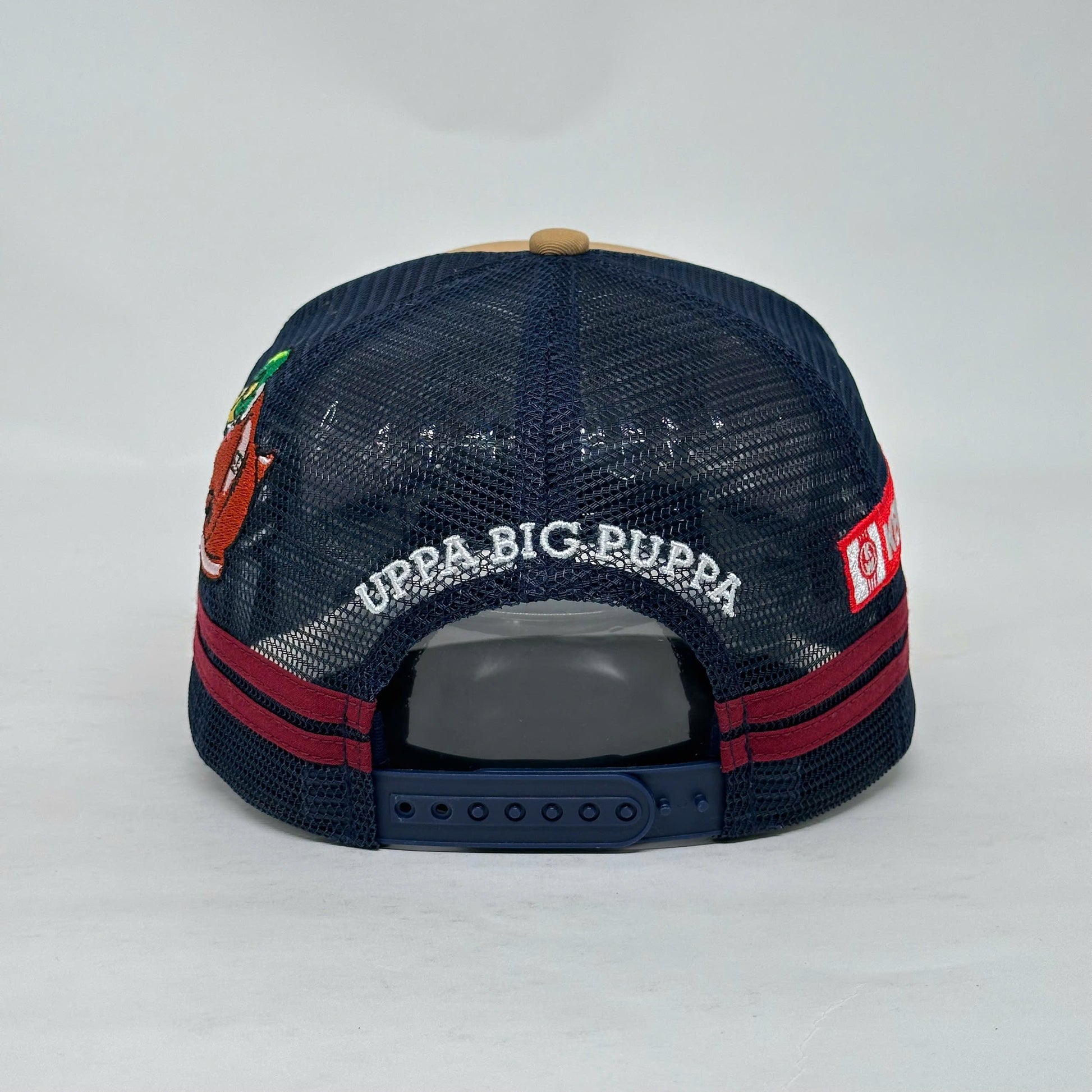 UPPA CARAMEL NAVY TRUCKER CAP