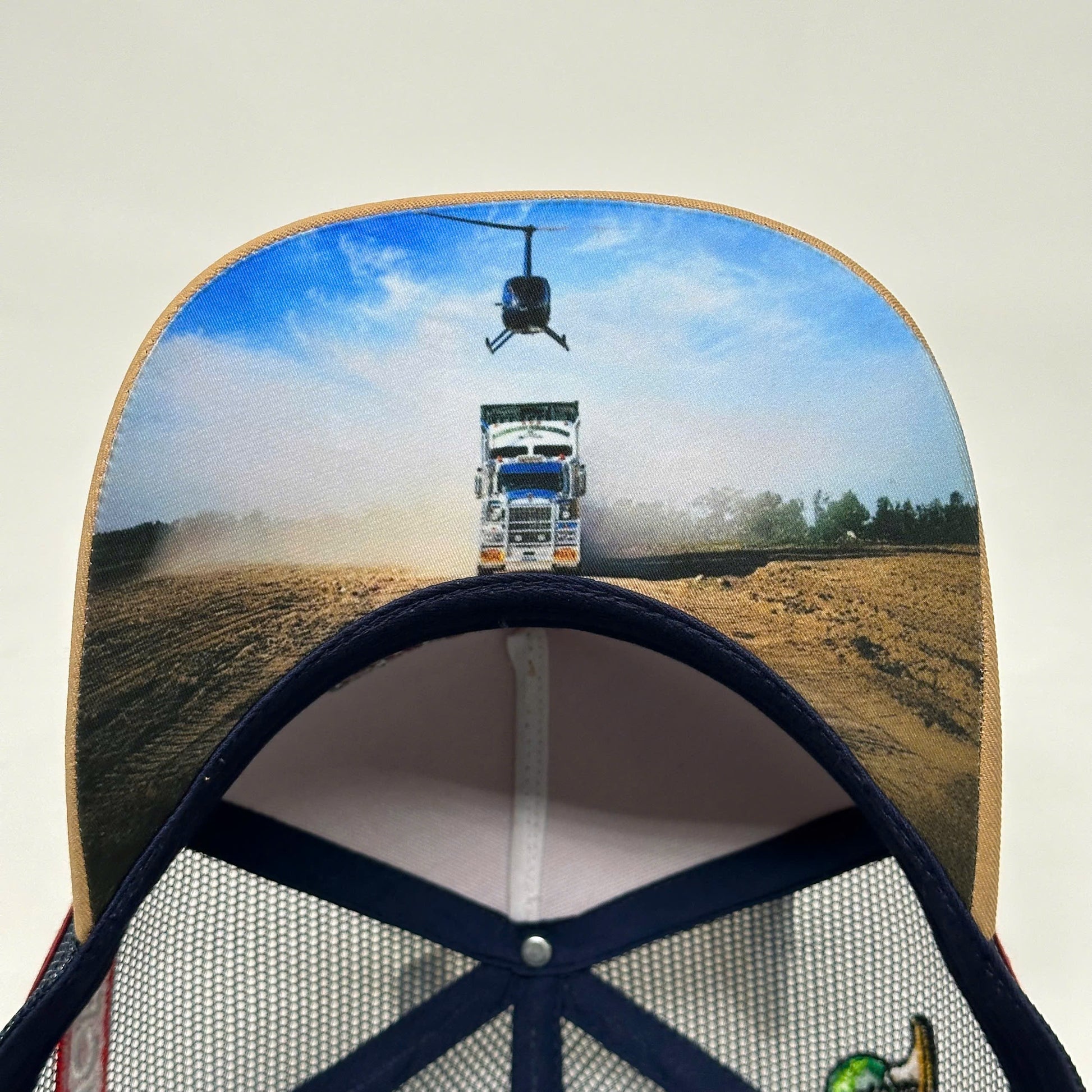 UPPA CARAMEL NAVY TRUCKER CAP