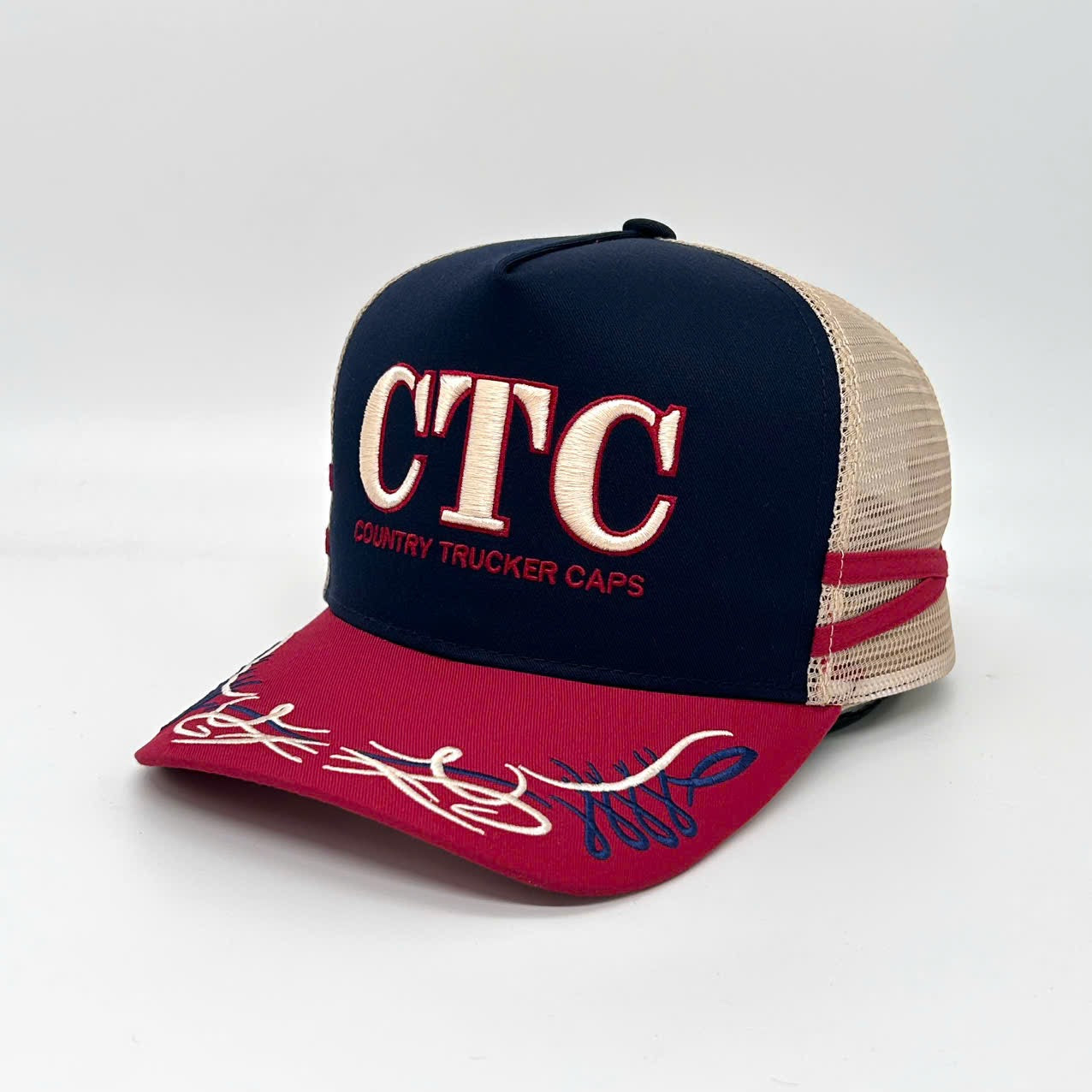 NAVY CHERRY TRUCKER CAP