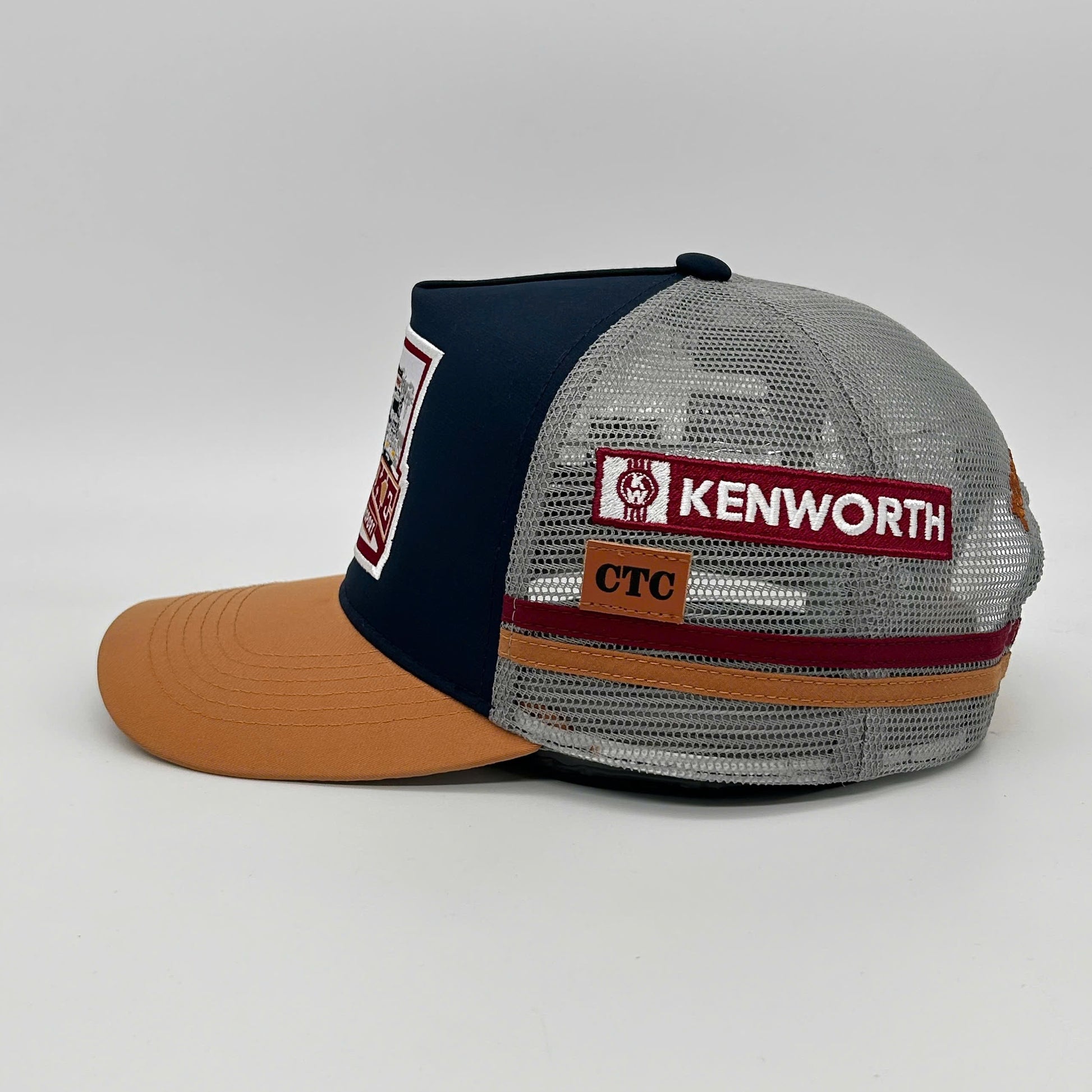 BURKE NAVY TAN TRUCKER CAP