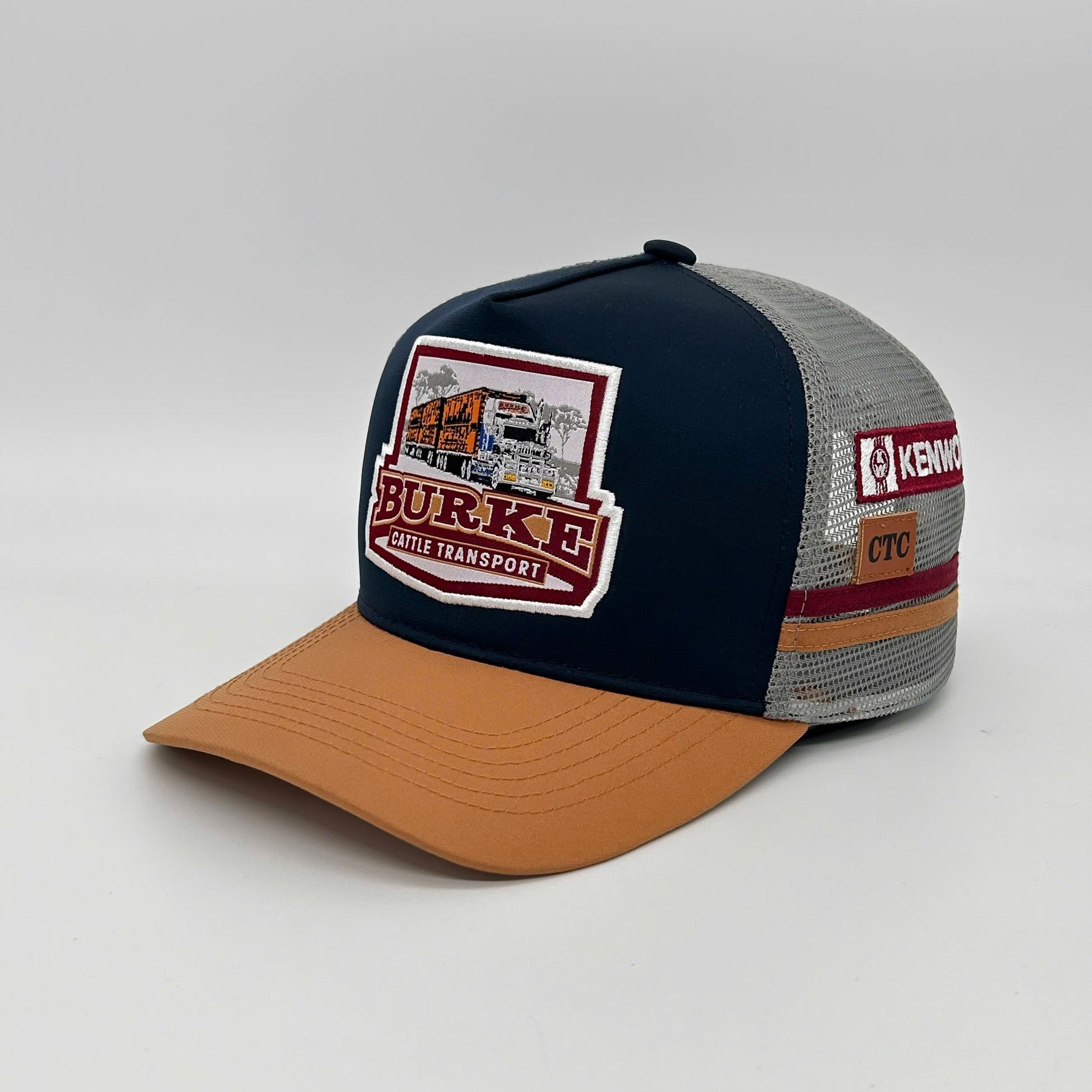 BURKE NAVY TAN TRUCKER CAP