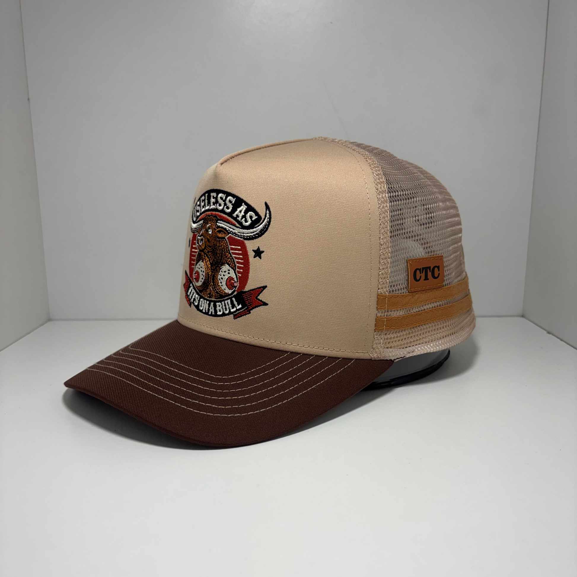 USELESS AS TITS ON A BULL 2.0  TRUCKER CAP