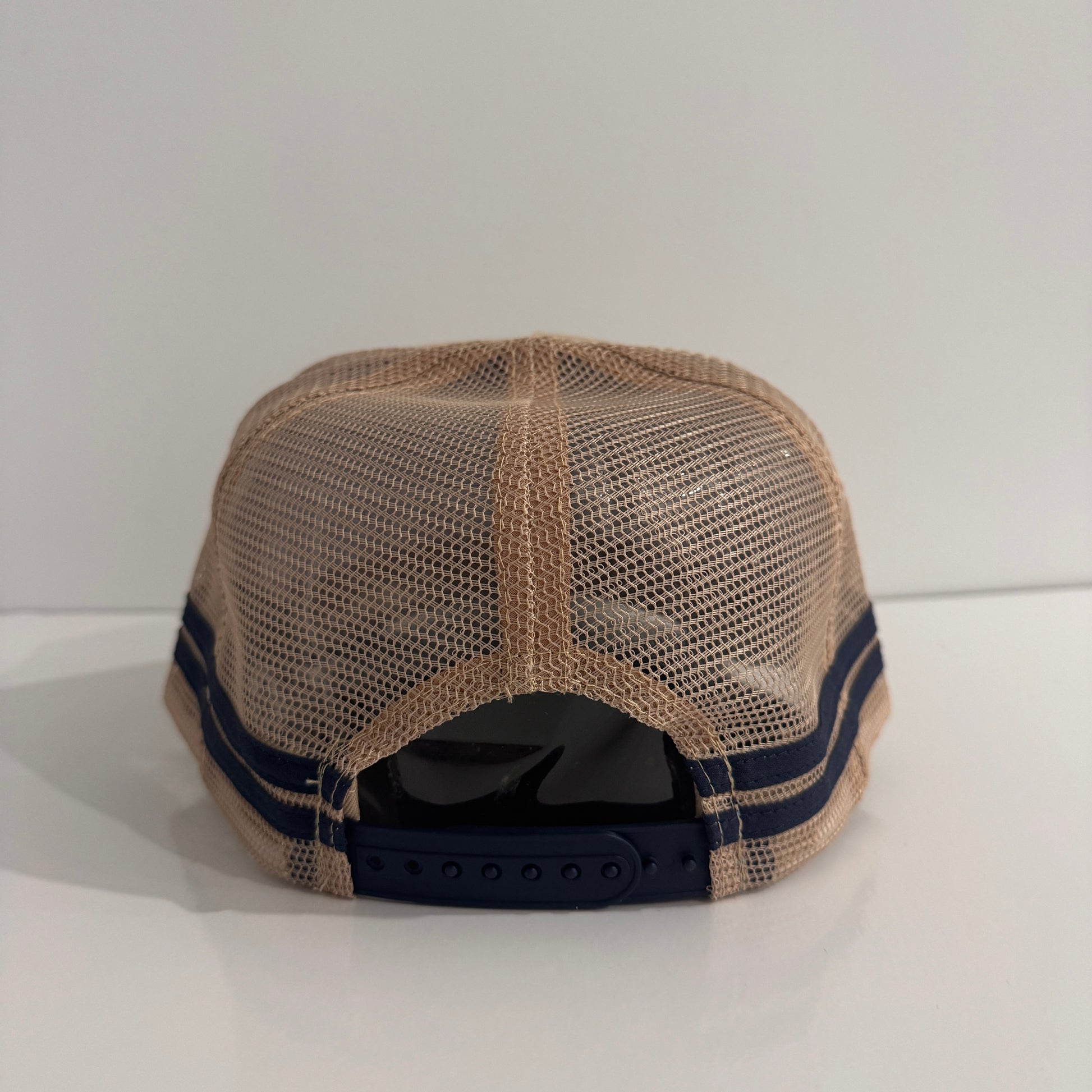 BEIGE RUBBER PATCH TRUCKER CAP