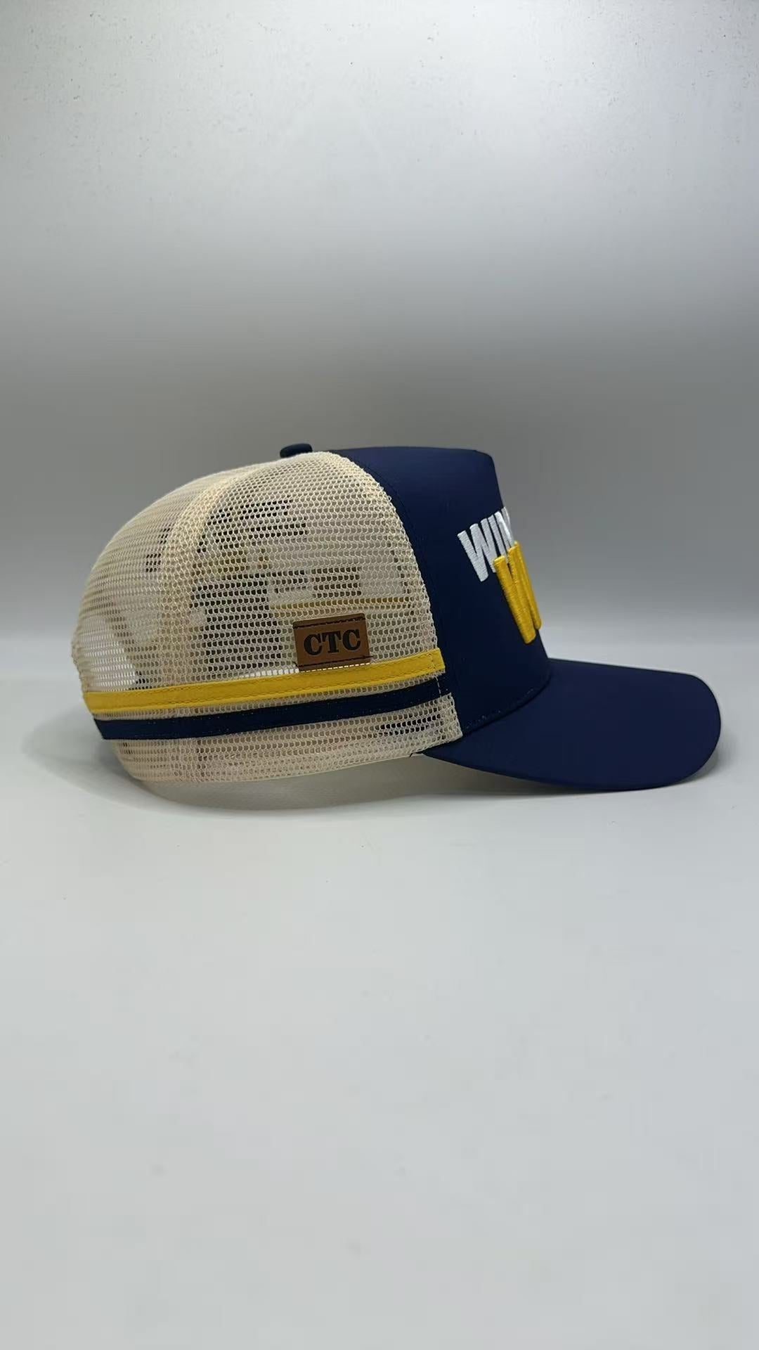 WINNERS WIN TRUCKER CAP