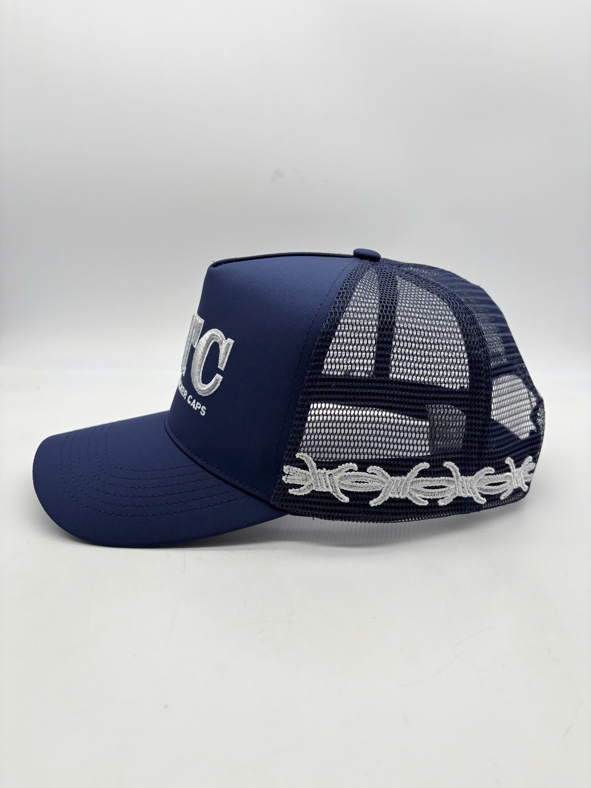 NAVY BARB WIRE TRUCKER CAP