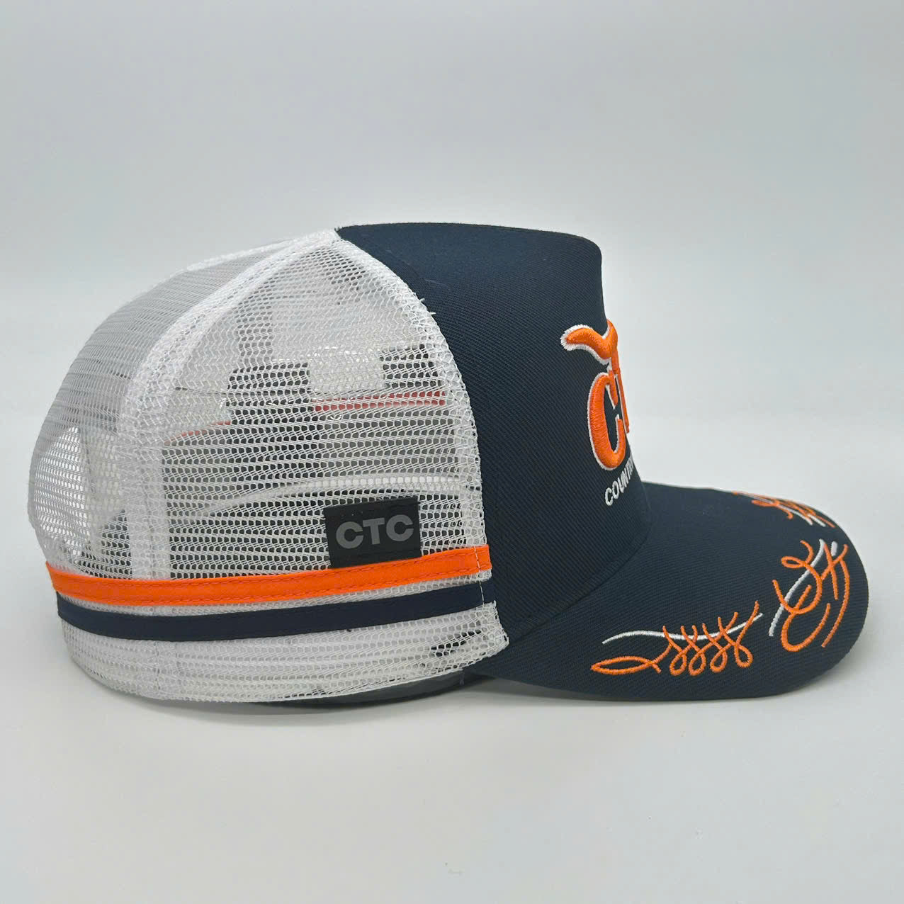 NAVY ORANGE TRUCK SCROLL TRUCKER CAP