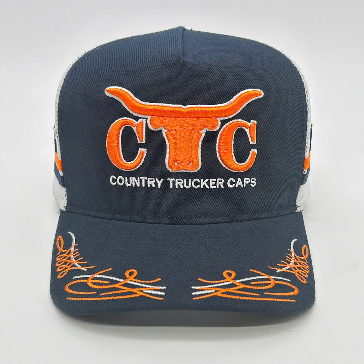 NAVY ORANGE TRUCK SCROLL TRUCKER CAP