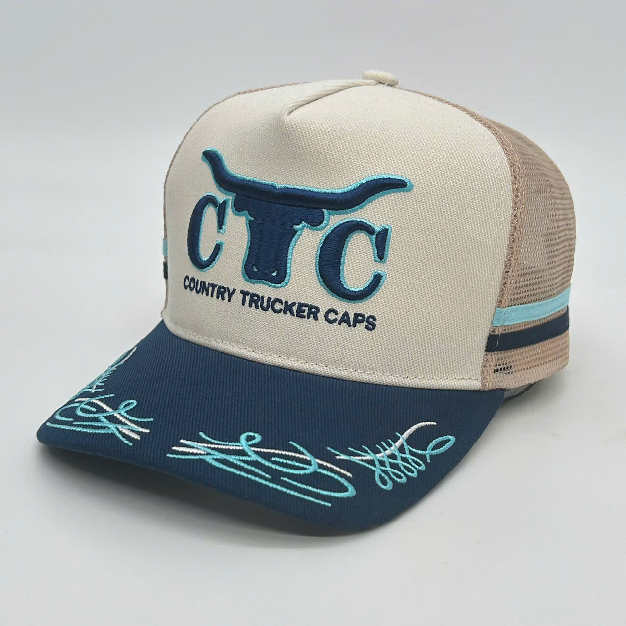 CREAM NAVY TRUCK SCROLL TRUCKER CAP