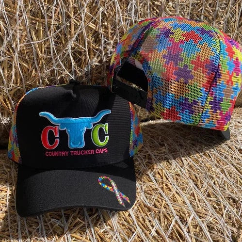 Black CTC cap with colourful puzzle piece mesh in support of autism awareness.
